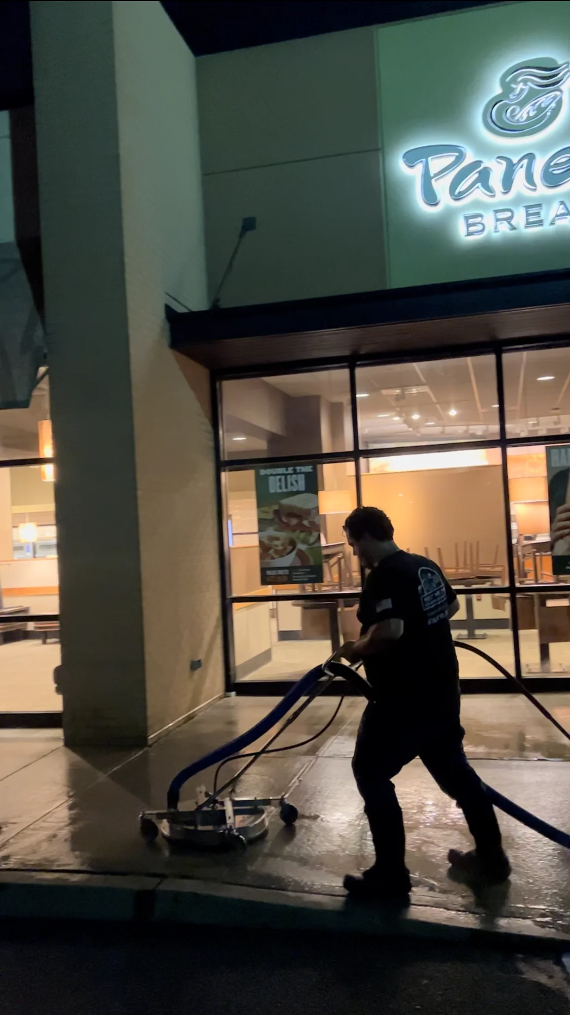 WeatherX washing a commercial storefront after hours