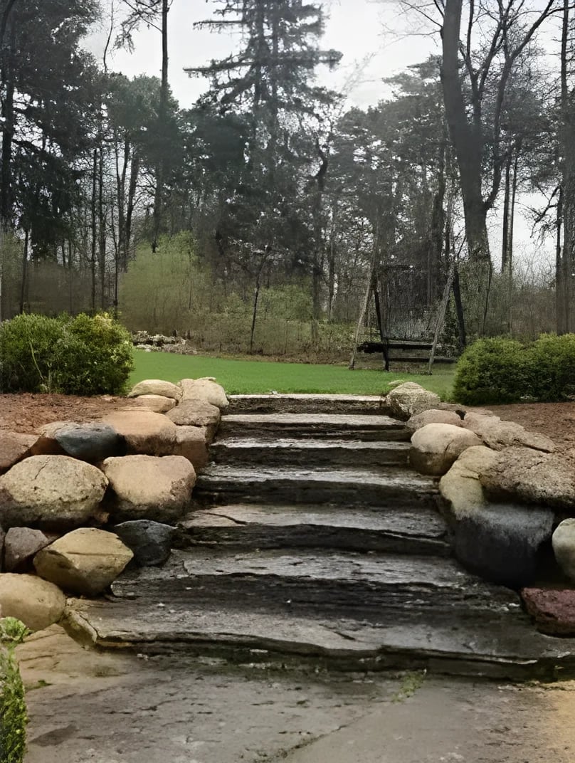 Stone steps covered in algae and grime before cleaning